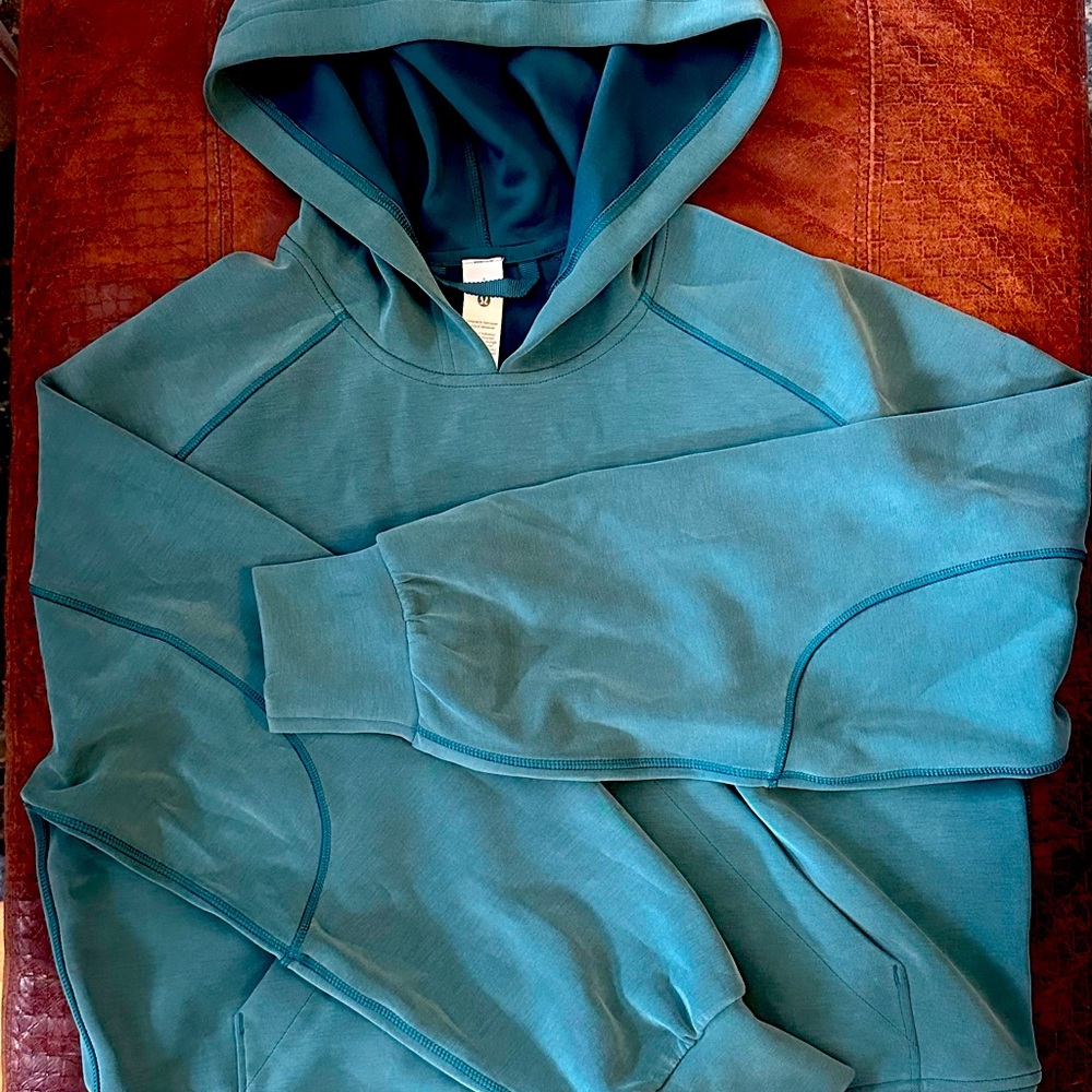 New with tags- Lululemon teal hoodie- very soft (like suede)